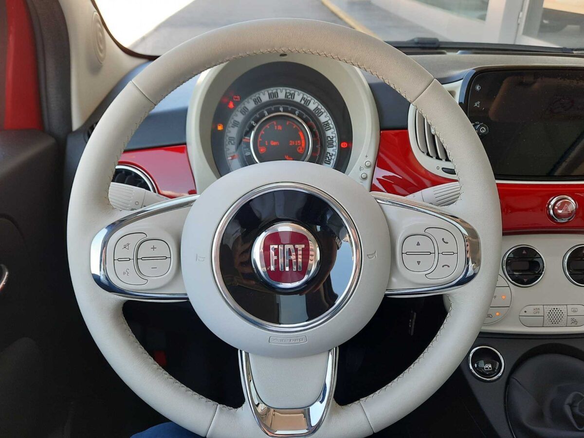 Fiat 500 híbrido GLP 1.2 69cv lounge en color rojo de km0